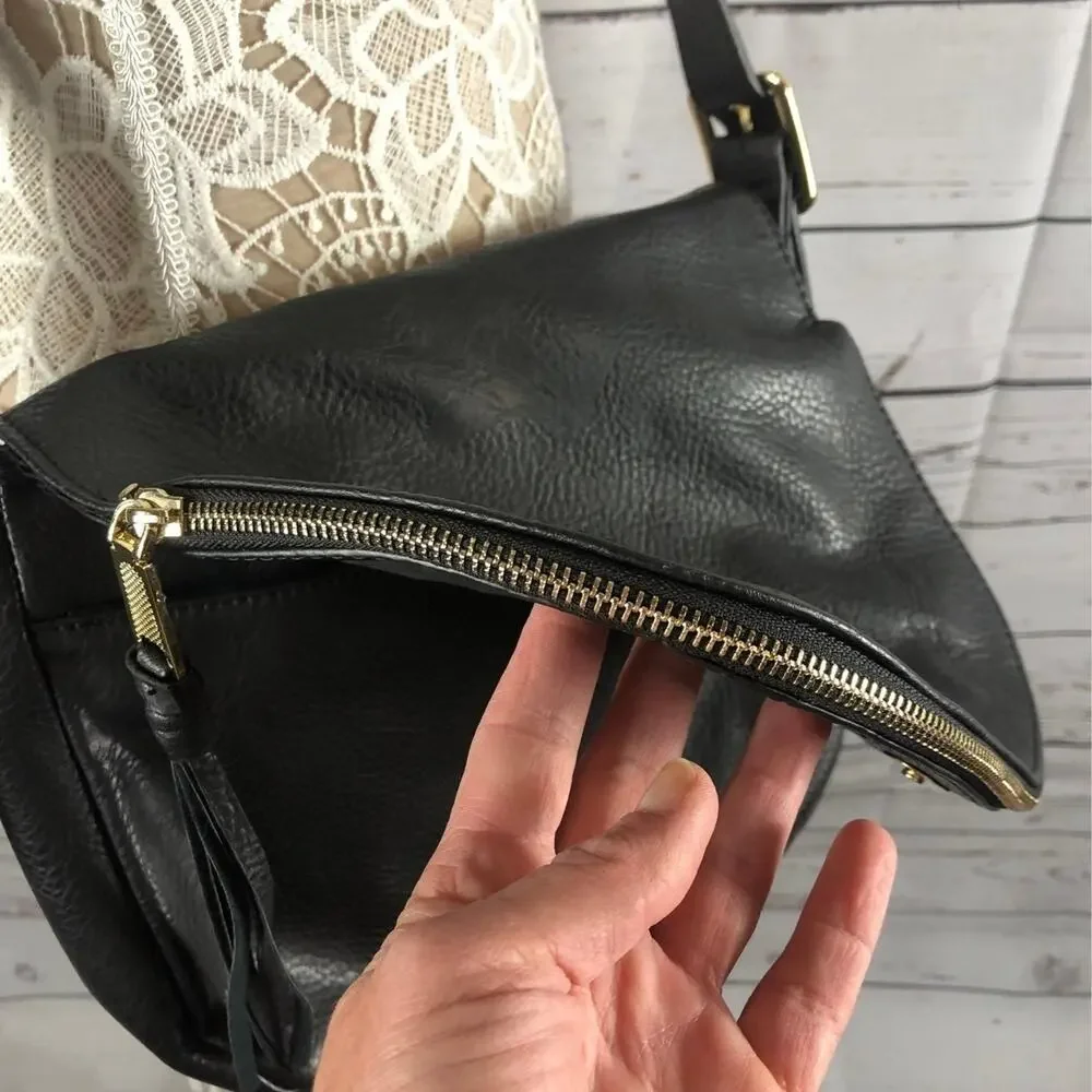 Juicy Couture shoulder crossbody bag in black with Gold embellishments.